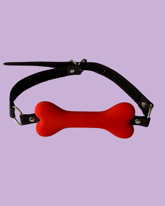 BDSM Mordaza de silicona con correa de cuero ajustable HUESO ROJO